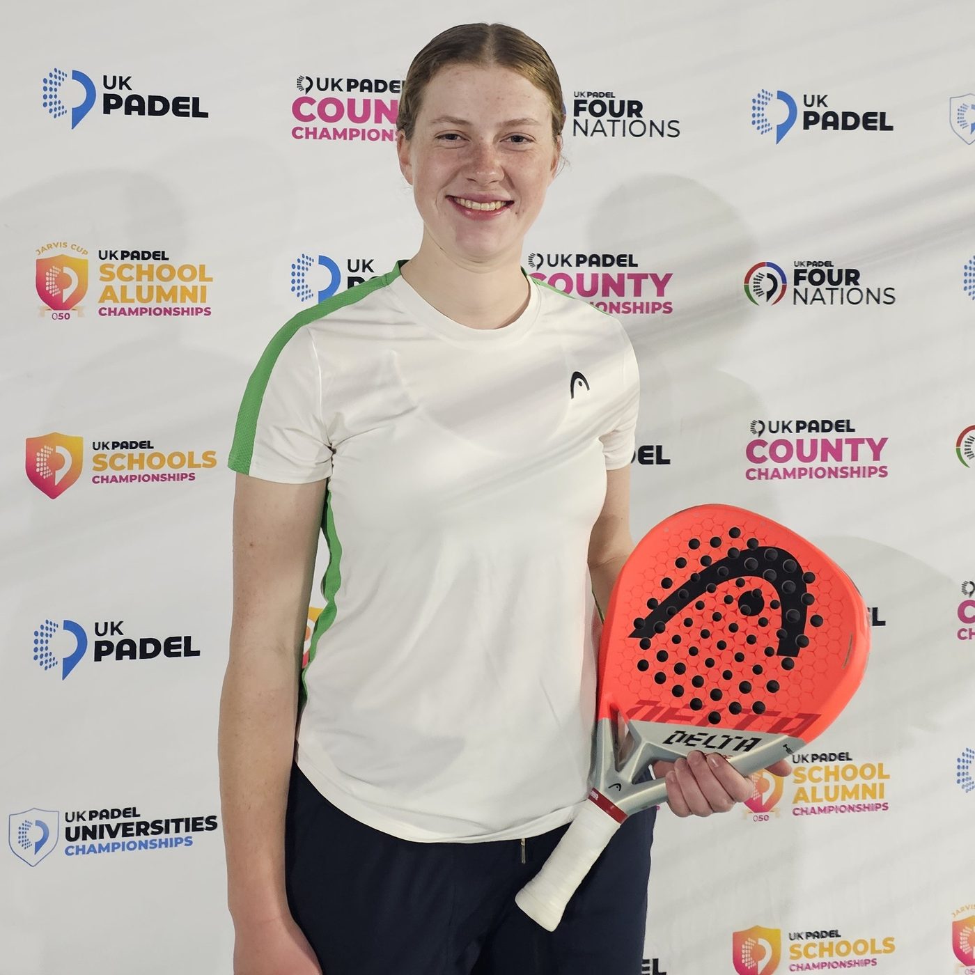 Anna Zuka holding her HEAD padel racket